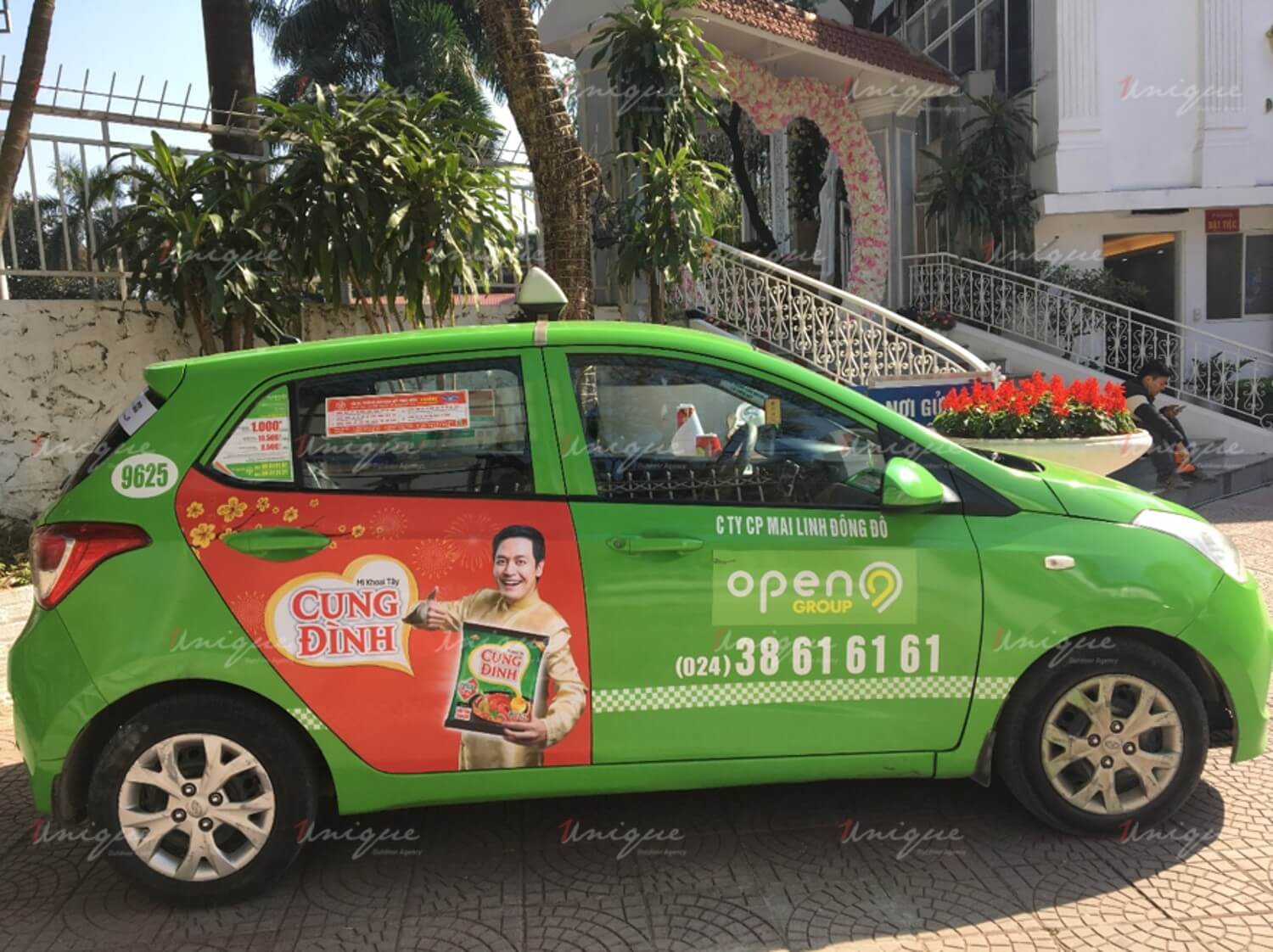 Dịch vụ quảng cáo trên taxi Open99